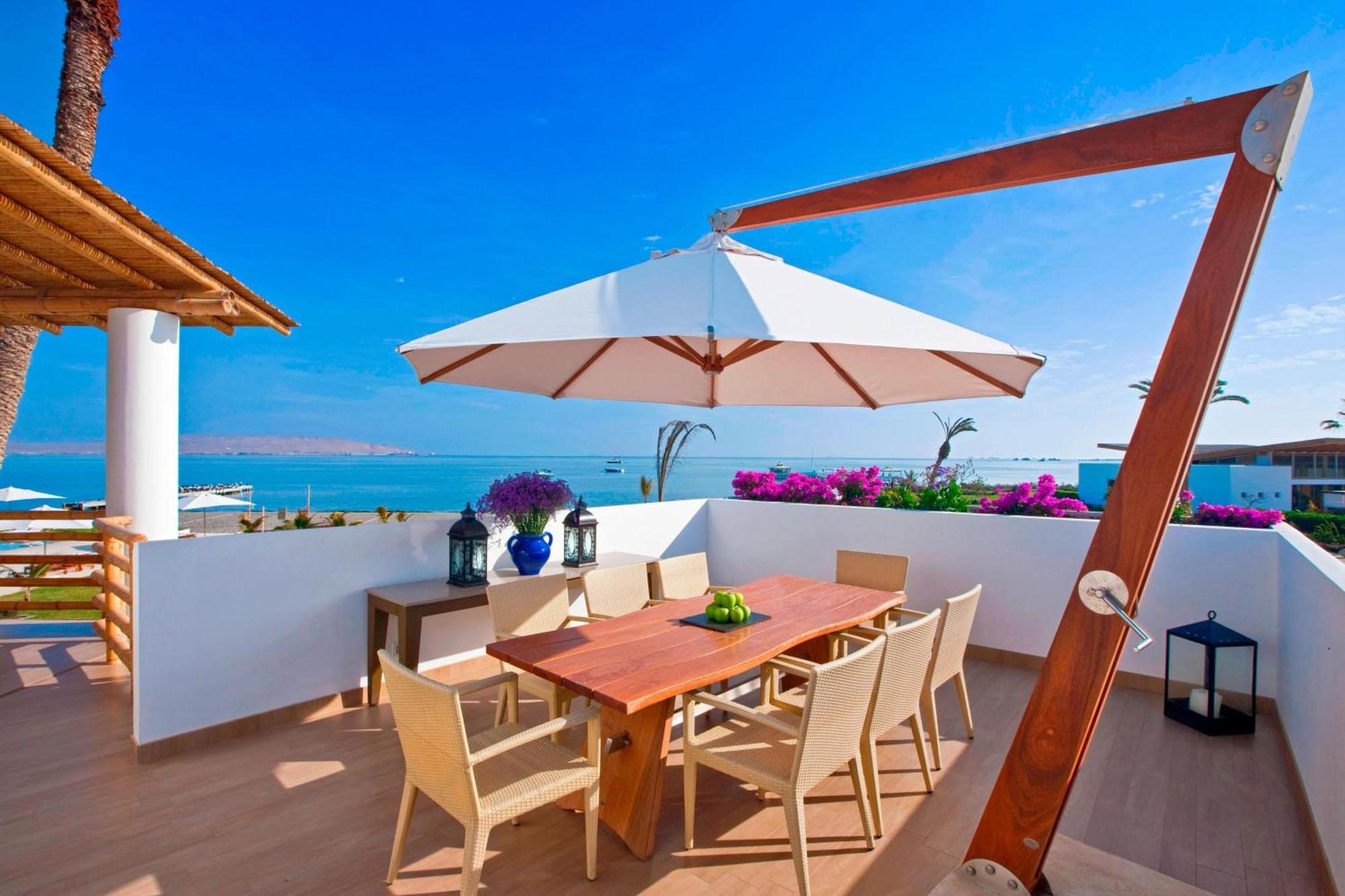 Hotel Paracas, A Luxury Collection Resort, Paracas Bagian luar foto A patio umbrella